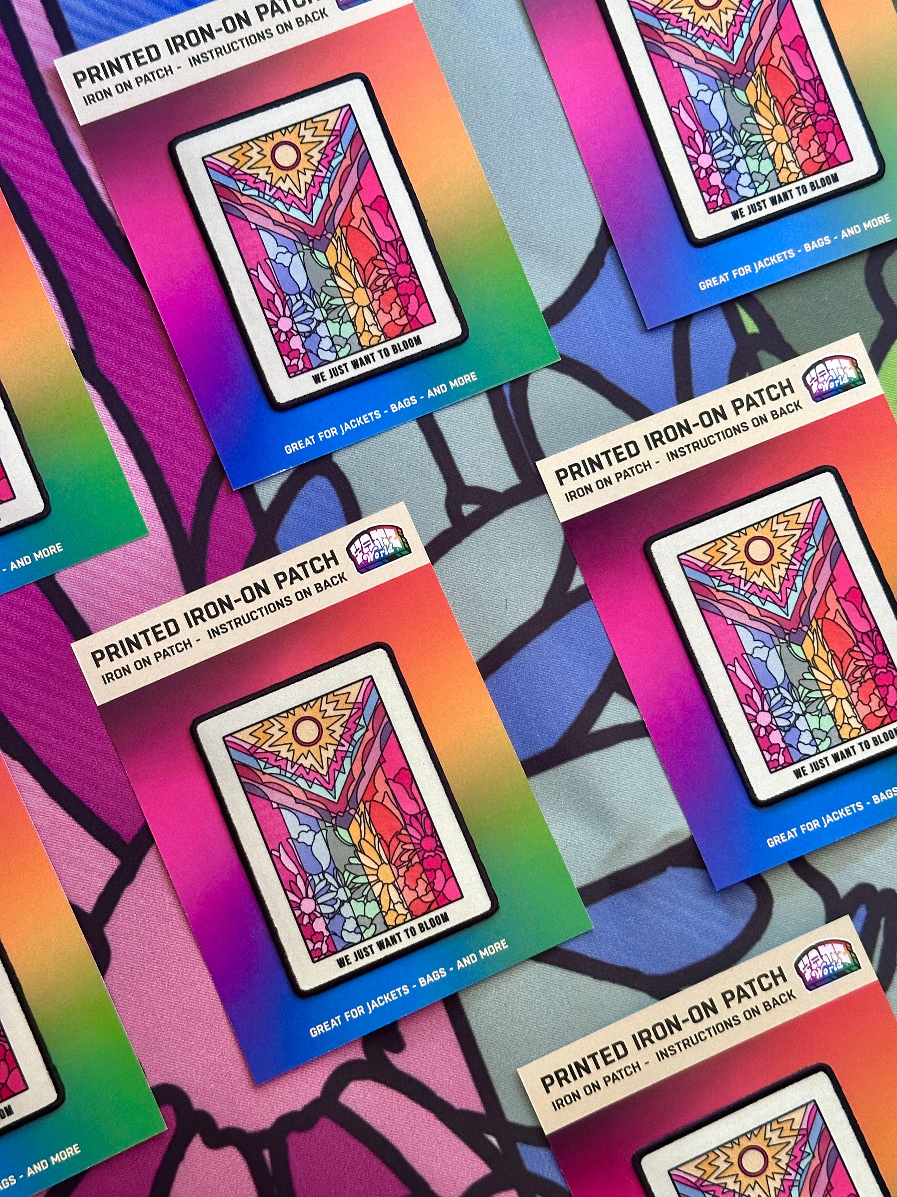 YAMZ: World of Color – wholesale Lapp – Blomma Pride-flagga Påstrykbar Patch1
