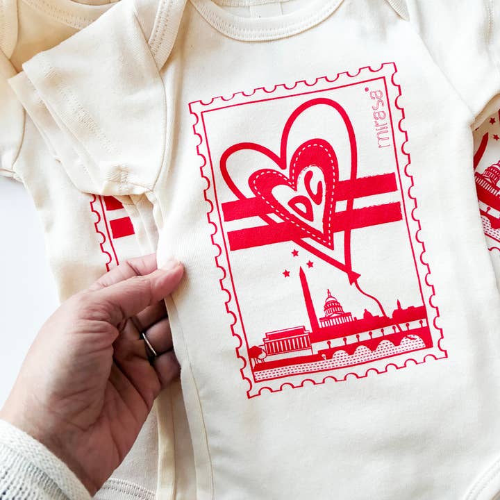 Amor DC Onesie: organic cotton for wholesale by Mirasa Design
