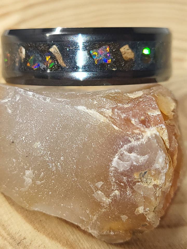 Black Ceramic Inlay Ring with Inferno Opal, Peridot, and Met for wholesale by Natural Evolution Design
