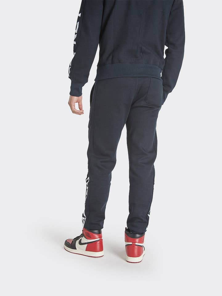 London Attitude marineblauwe joggingbroek met print en naai voor wholesale door London Attitude