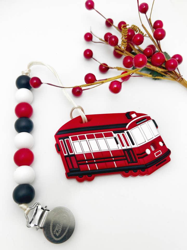 Red Trolley Silicone Baby Teether with Pacifier Clip for wholesale by Gummy Chic