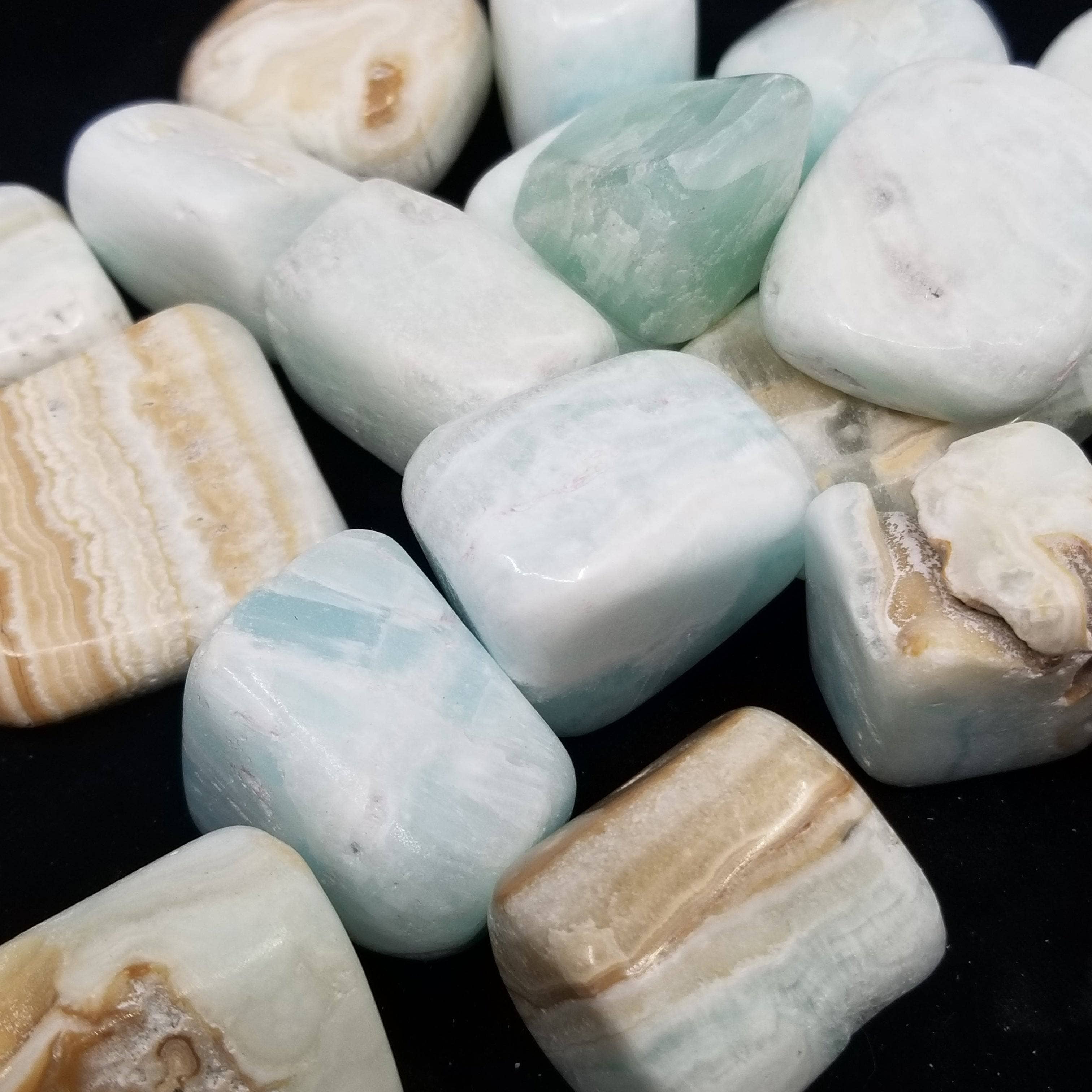 Blue Caribbean Calcite Tumbled Stone - 1 KG for wholesale on Faire2