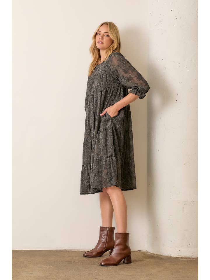 CHARCOAL PRINTED TEXTURED FLORAL ROUND NECK TIERED DRESS for wholesale on Faire2