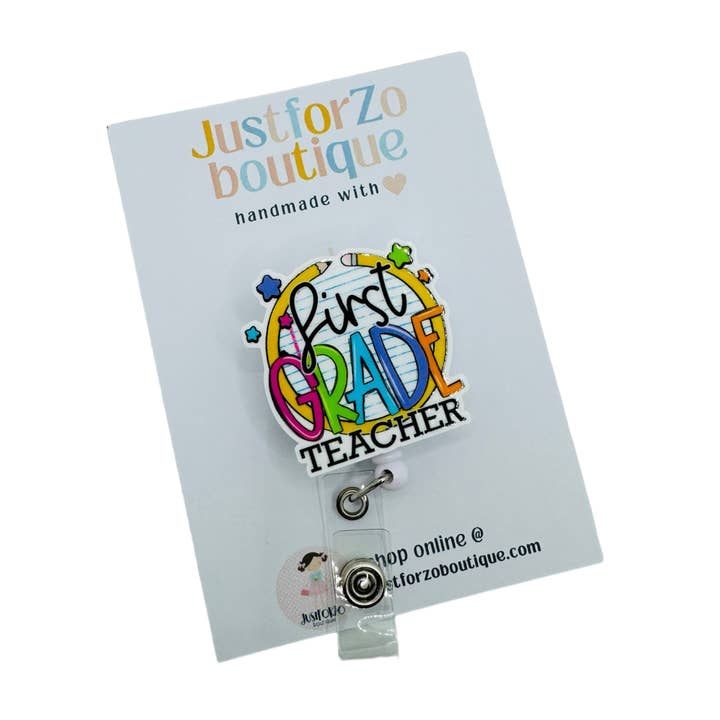 First Grade Teacher Badge Reel for wholesale by JustforZo boutique, Inc.