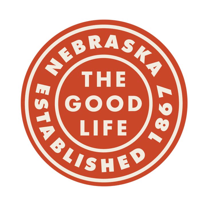 Autocollant Nebraska La belle vie (rond) pour la vente par Heartlandia