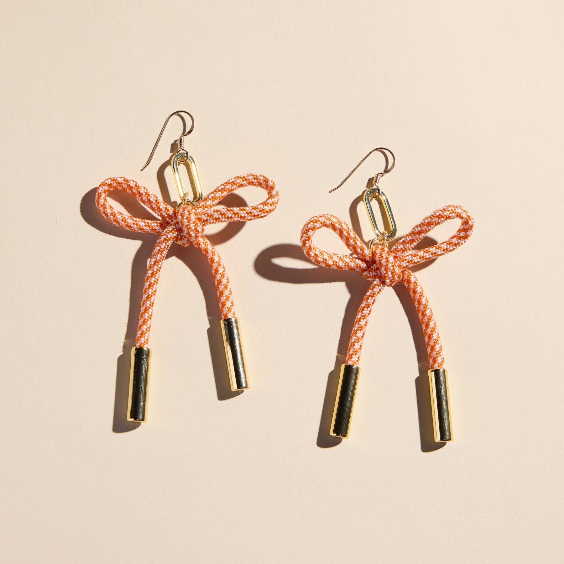 Nickel and Suede - Wholesale Dangle Earrings - Orange & White Simone Cord Earring0