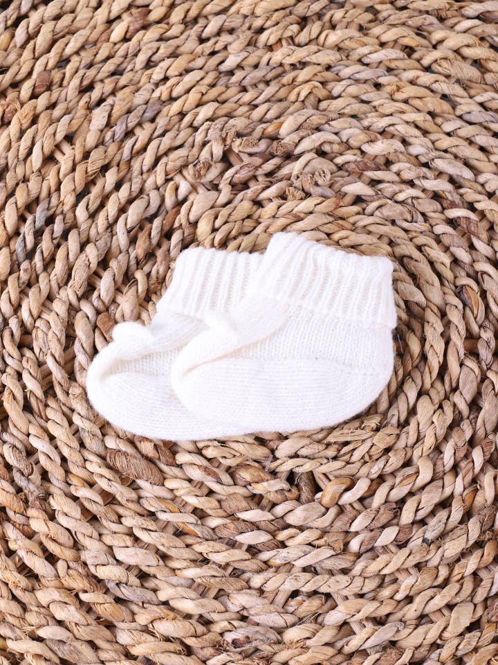 Booties knitted in wool | LITTLE TEDDY BEAR for wholesale by Wedoble: sustainable children's fashion