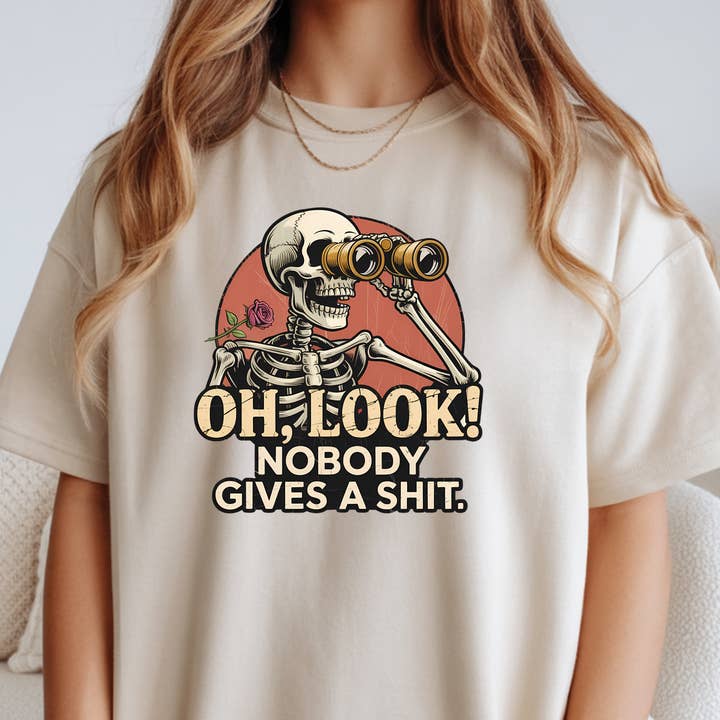 Oh Look Nobody Cares Funny Skeleton Graphic T-Shirt for wholesale by TheWorldOfMYes