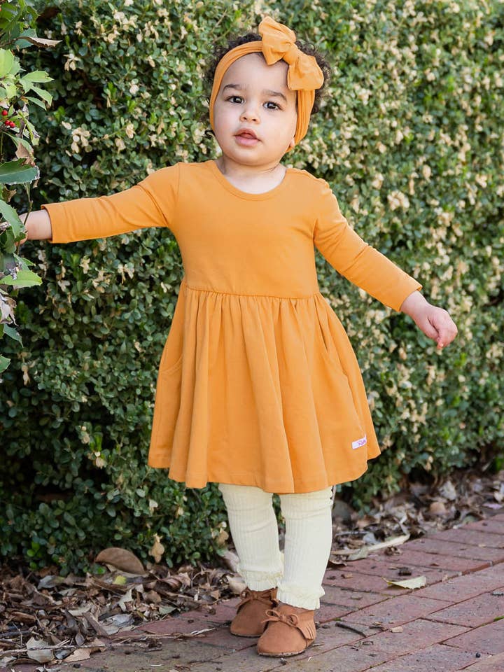 Off White Girls Heather Oatmeal Rib Knit Footless Ruffled Tights
for wholesale on Faire2