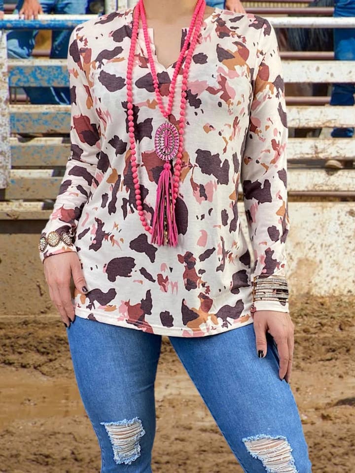 The Bling Barn - Wholesale Tunic - Women's - Meet Me In The Chutes Long Sleeve Cow Print Top1