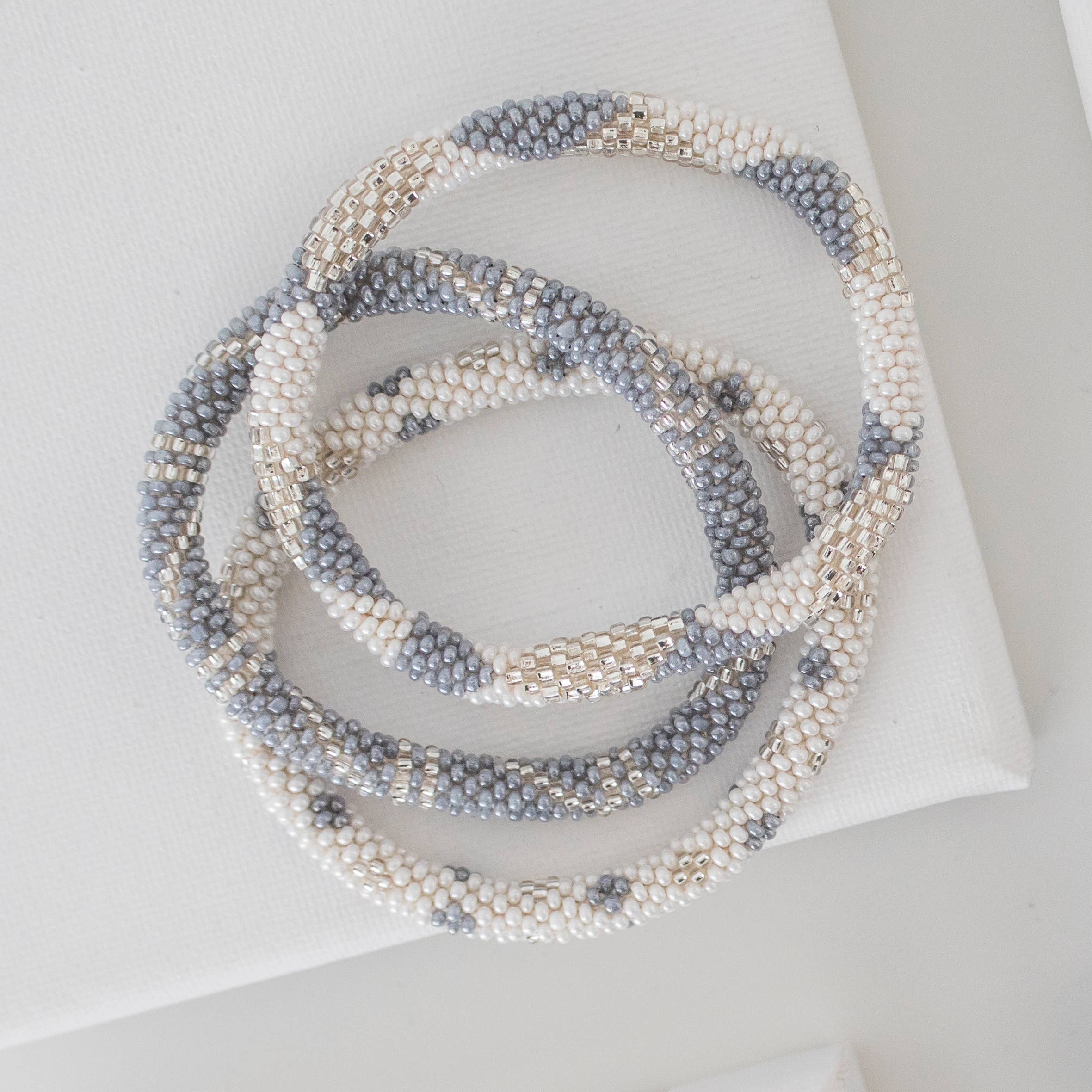 Aid Through Trade - Wholesale Jewelry Set - Roll-On® Bracelets First Mate - Set of 124