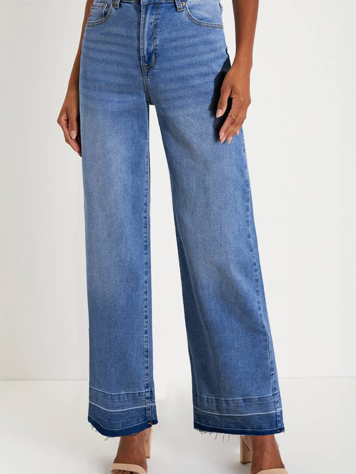 Jean droit taille haute ample avec ourlets bruts et poignets uniques pour la vente par FULL TIME PURCHASE