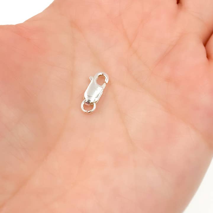 0925LC1SS. 10MM White Sterling Silver Lobster Clasp for wholesale by Tresor Jewelry Inc.