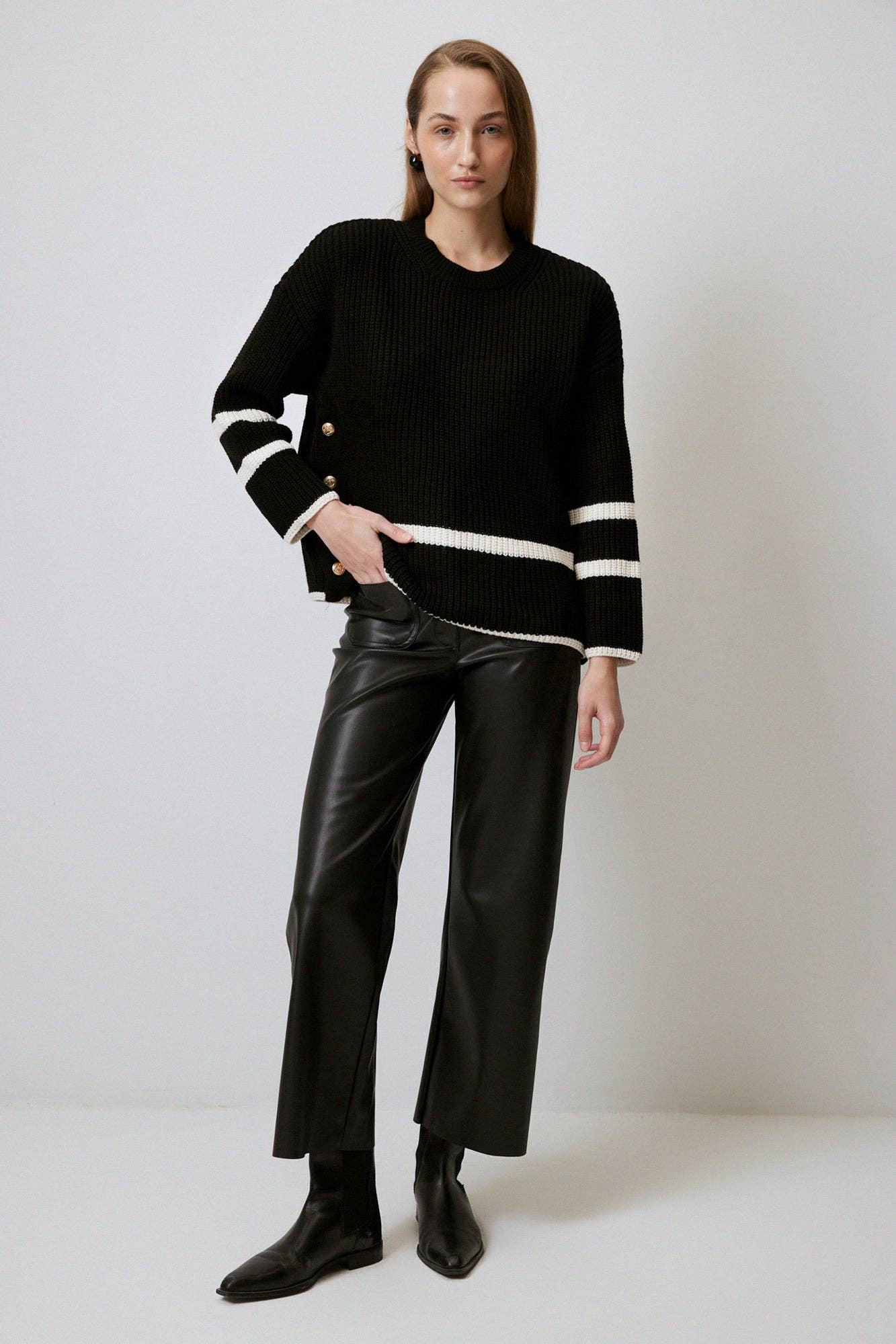 Black JUMPER FEATURING GOLD BUTTONS for wholesale on Faire1