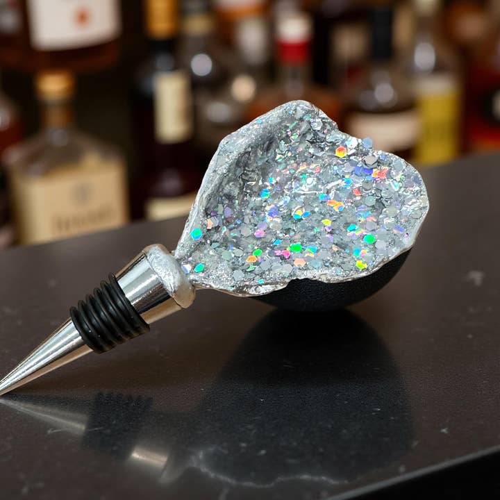 Disco Tide Glitter Oyster Shell Wine Stopper – Silver Rim and other Purchase Wholesale crushed oyster shell. Free Returns & Net 60 Terms on Faire trending on Faire.