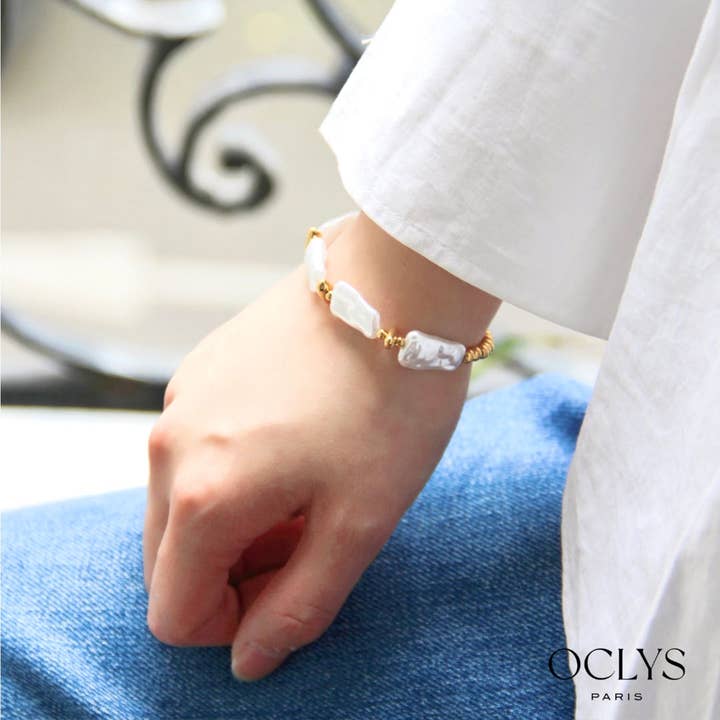 Oclys - Wholesale Armband met kralen - Roestvrijstalen armband en Parina-kralen