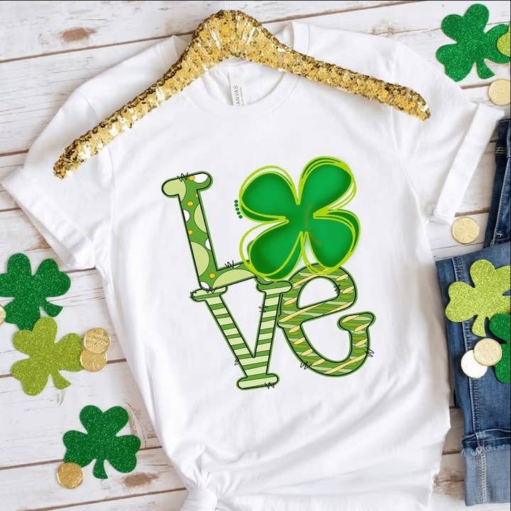 Black LOVE Happy St Patrick's Day Shirt, Shamrock Shirt, Saint Pat for wholesale on Faire