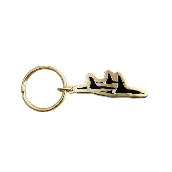Orca Pod Enamel Keychain for wholesale by Sablewood Paper Company