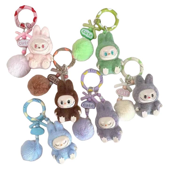 Sitting Pose Flocked Keychain Bag Car Keyring Decor Silicone for wholesale by Auraquise