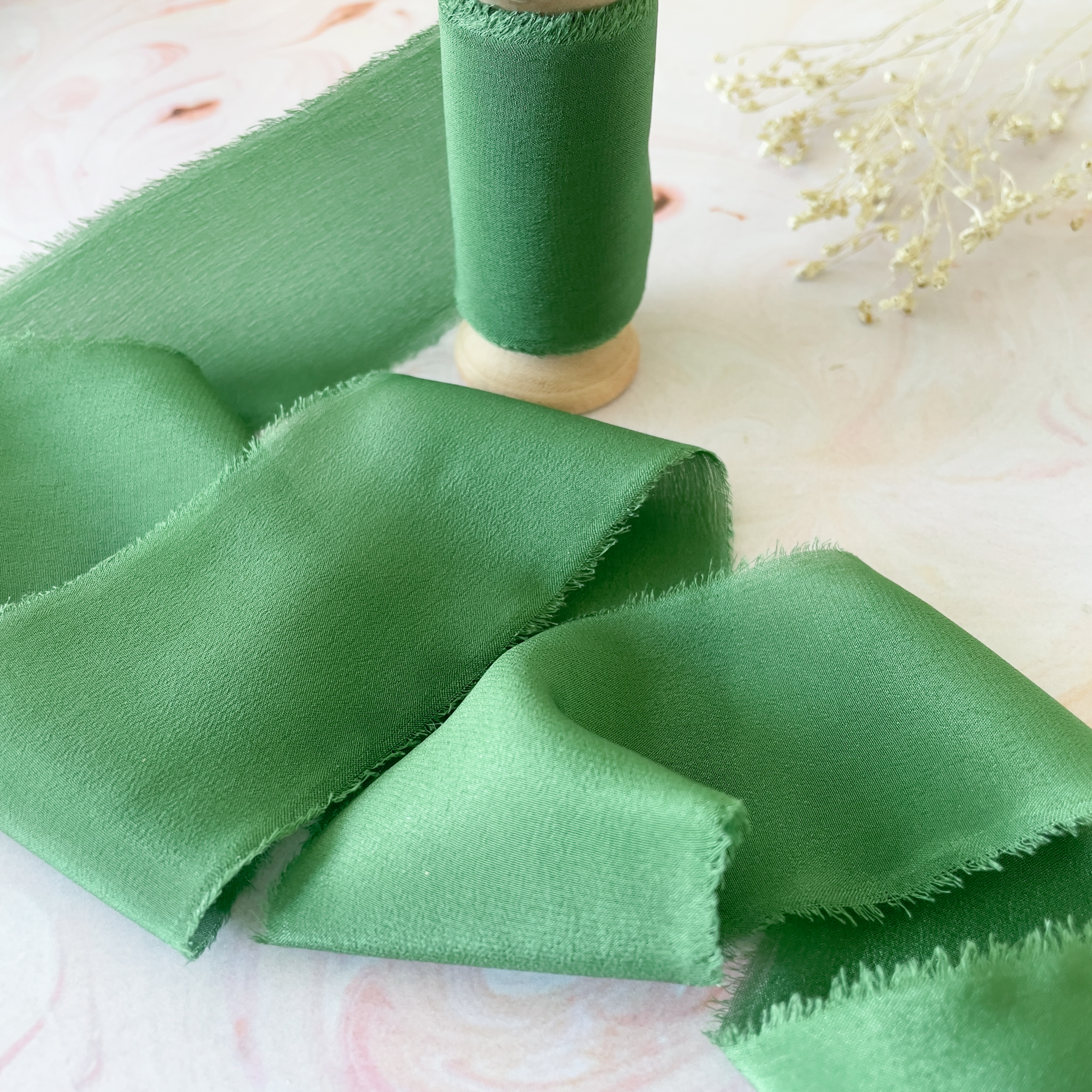 The Natural Paper Company – wholesale Ribbon – Gift wrapping – Emerald Green Silk Ribbon | Raw Edge Silk on a Wooden Reel2