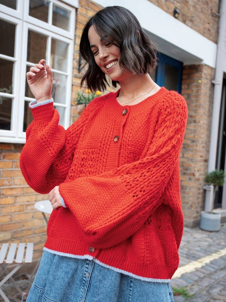 Cardigan à manches ballon en pointelle Brigit - Orange pour la vente par Cara & The Sky