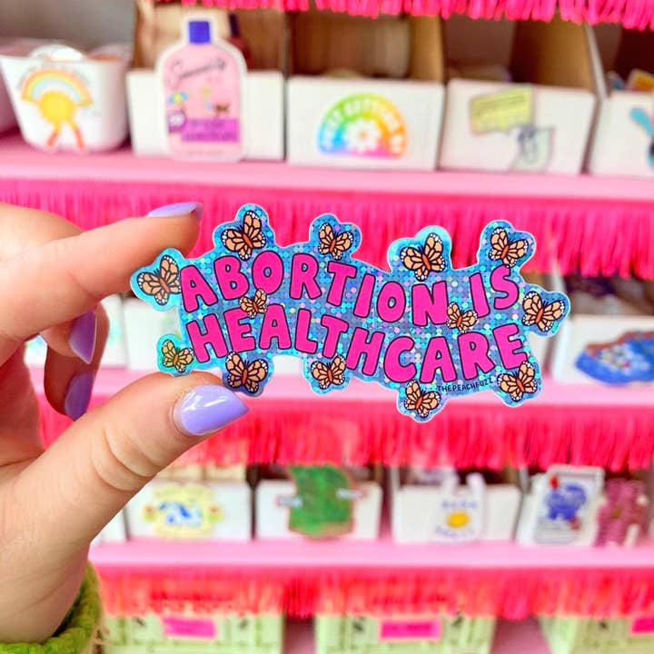 The Peach Fuzz - Wholesale Sticker - Abortion Is Healthcare Glitter Sticker5