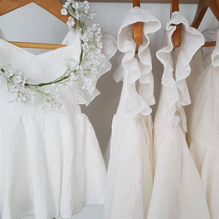 Vivian Embroidered White Cotton Baby Girl Romper and other Purchase Wholesale embroidered workwear. Free Returns & Net 60 Terms on Faire trending on Faire.