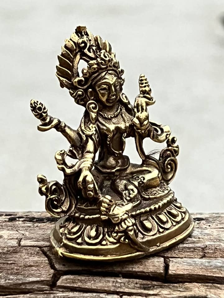 Small Brass Female Buddha Green Tara Dolma Statue - Nepal and other Purchase Wholesale dolma. Free Returns & Net 60 Terms on Faire trending on Faire.