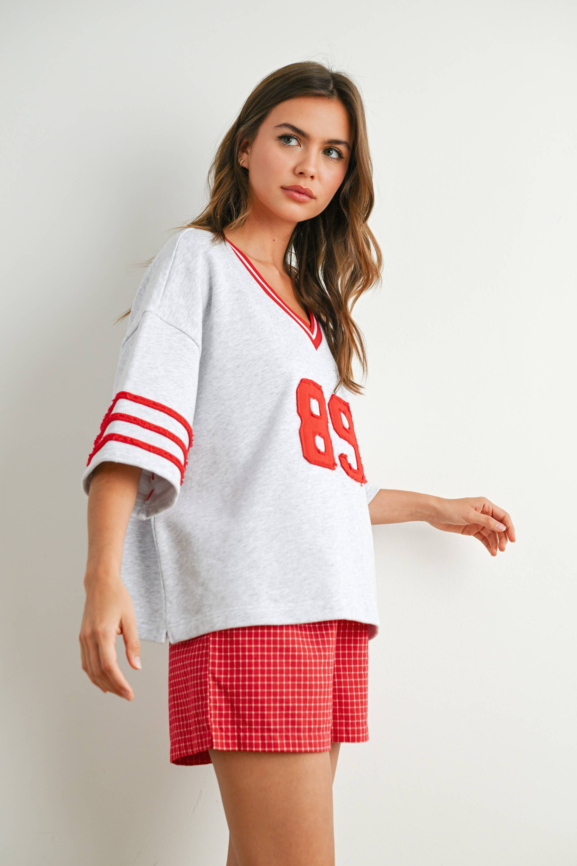 BUTTERMELON - Vendita all'ingrosso Maglietta - Donna - Maglia oversize sporty Varsity Spirit - BMT773432