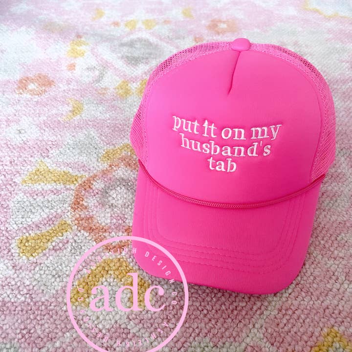 AshleighDesignCo - Wholesale Trucker Hat - Women's - PUT IT ON MY HUSBAND'S TAB Trucker Hat