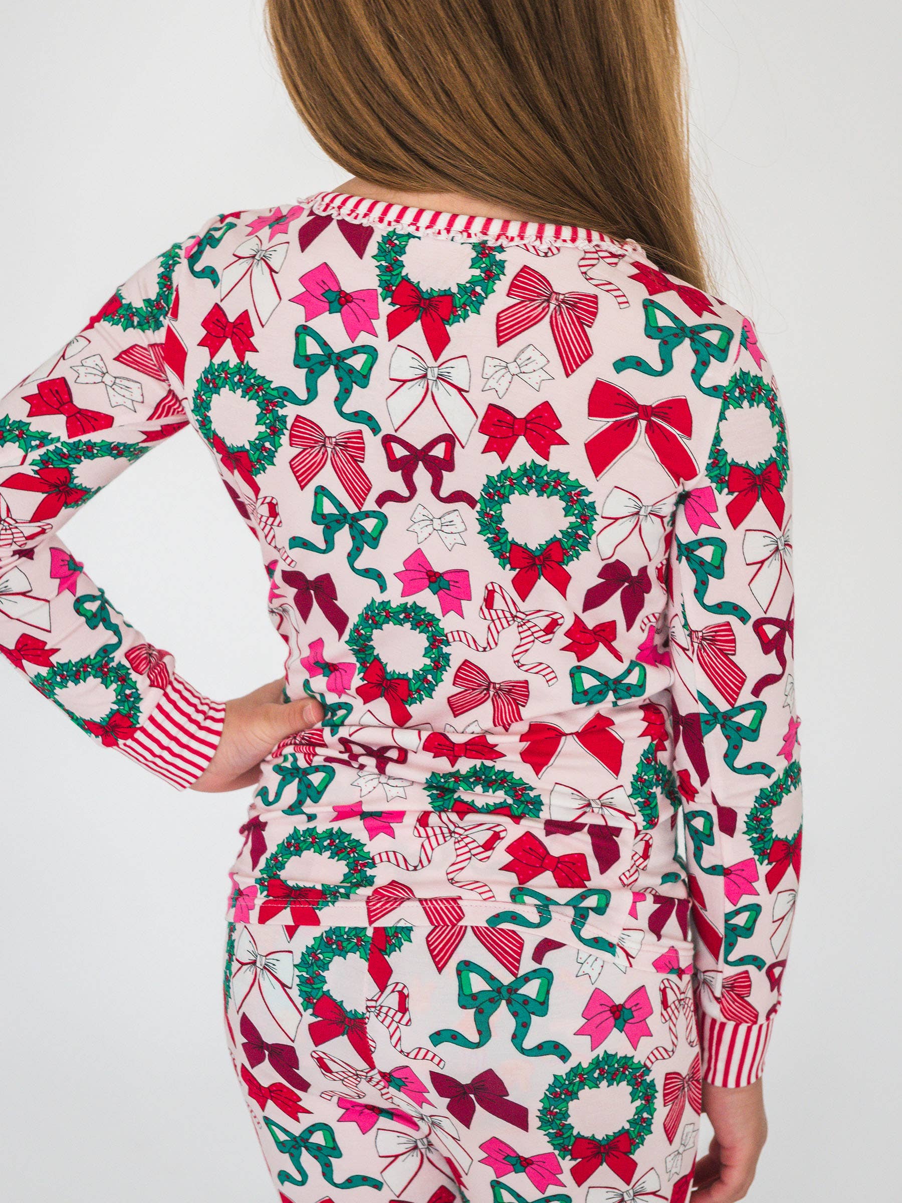 Pink SoftSnooze™ Girls Bamboo Viscose Holly Bows Ruffle Long Sleeve Pajama Set for wholesale on Faire2
