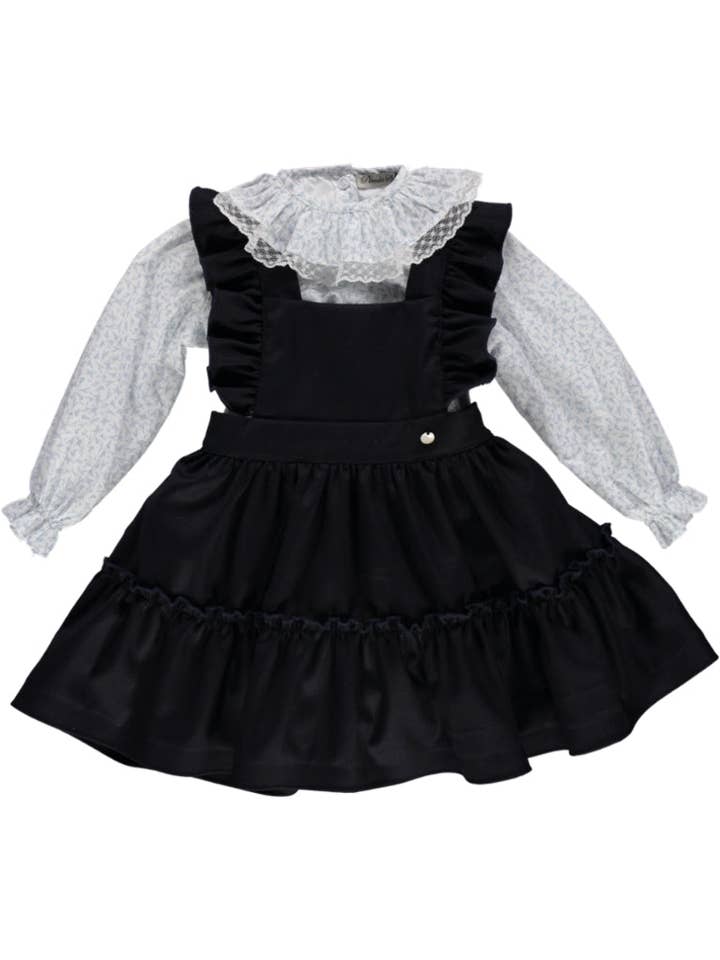 Completo blu navy da bambina con blusa fiorita per la vendita all'ingrosso da parte di Piccola Speranza