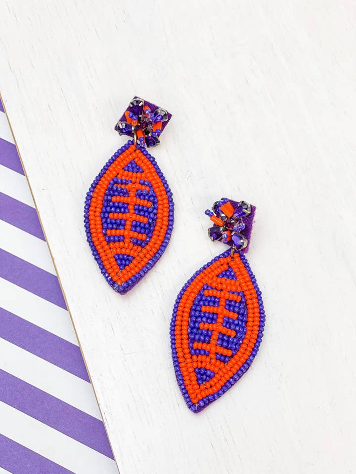 Glitzy Post Football Dangle Earrings - Purple & Orange for wholesale by Prep Obsessed Wholesale