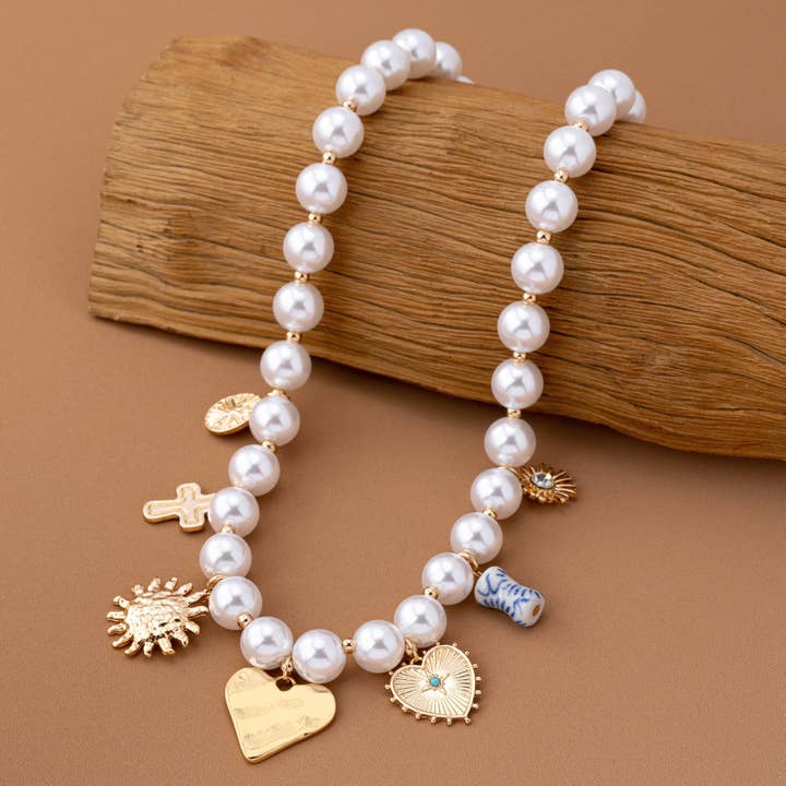GOLD PEARL NECKLACE-HEART PORCELAIN CROSS SUNBLAST | 80N92610 for wholesale on Faire4