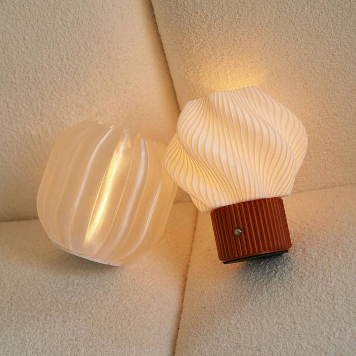 Colorless Mini Swirl Portable Lamp, Wireless and Rechargeable for wholesale on Faire10
