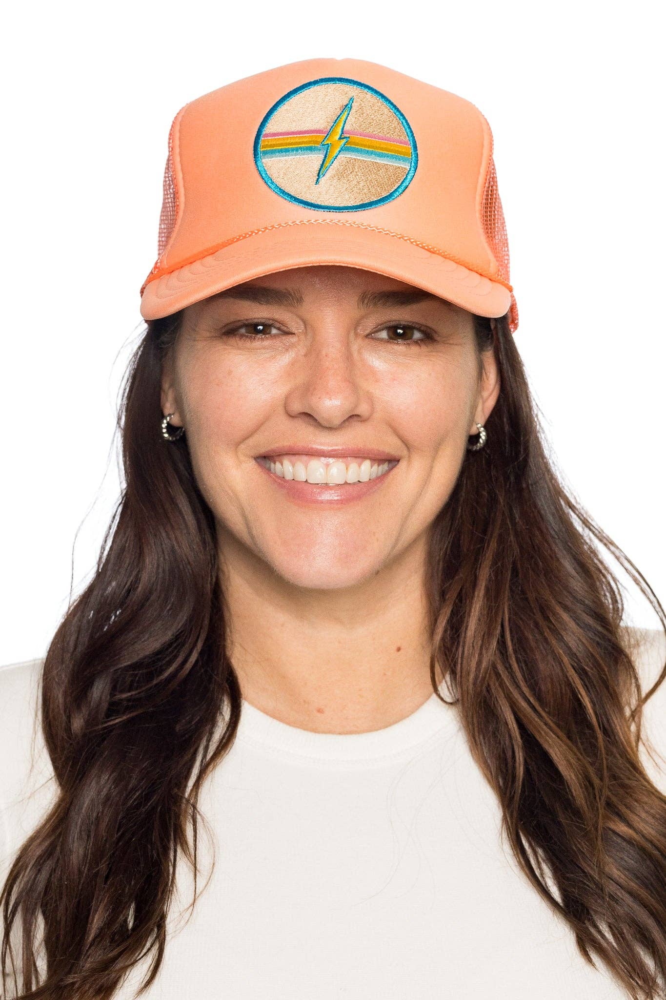 Electric Rainbow Trucker Hat in Coral for wholesale on Faire4
