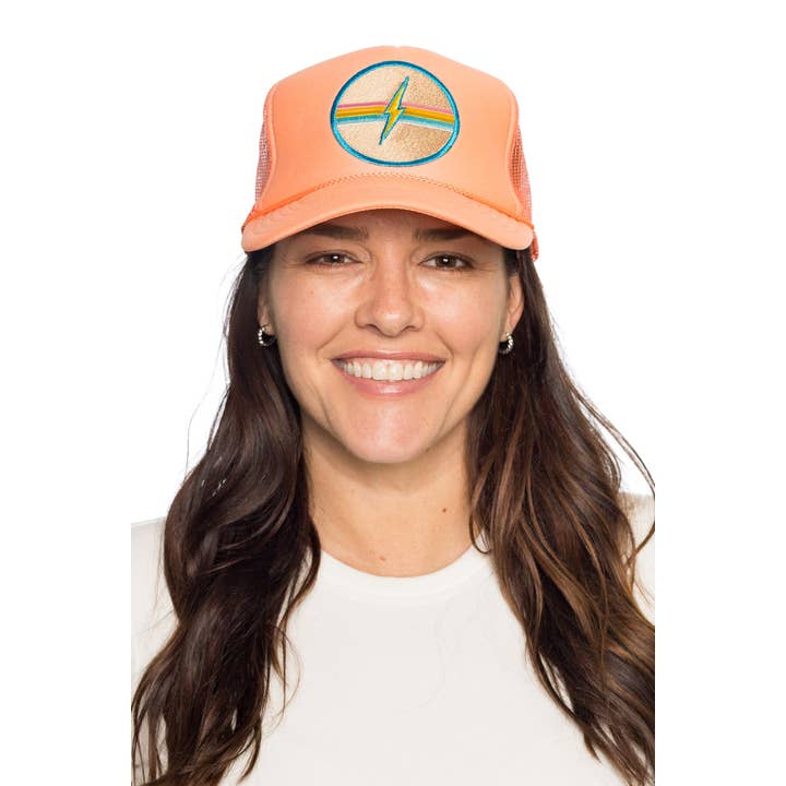Electric Rainbow Trucker Hat in Coral for wholesale on Faire4