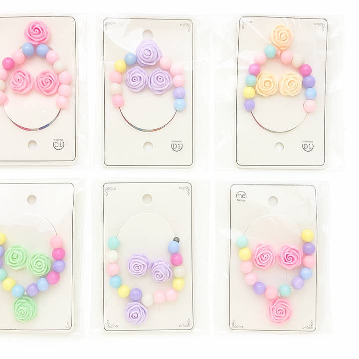 Kinderen Roze Kralen Armband & Oorbellen Set – 12ST voor wholesale door Majestic Wholesale