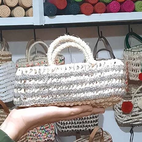 Moroccan straw basket with silver sequin for wholesale by MARRAKECH METACRAFT LTD
