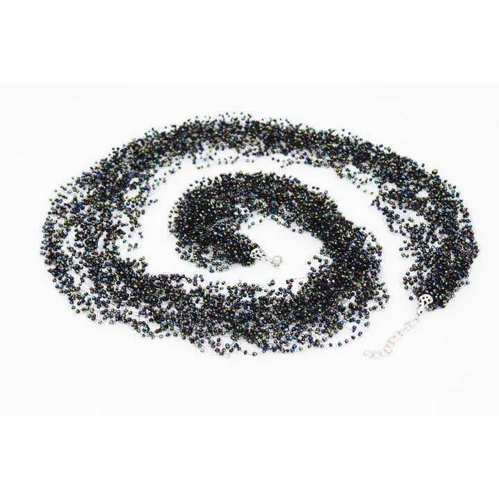 Erklæring Multi Strand lang halskæde sort Iris halskæde Peacock iriserende metallisk smukke mousserende 70 farver for engroshandel hos Ninolia