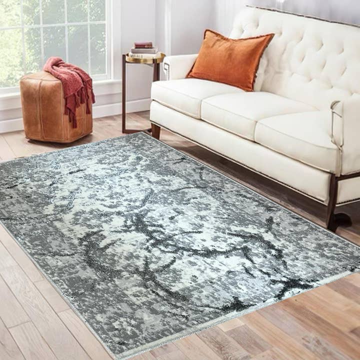 Penina Abstract Luxury Area Rug in Gray with Silver Circles for wholesale by Amazing Rugs