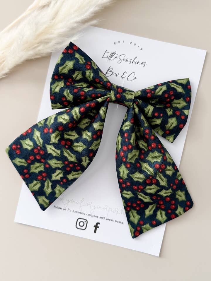 Navy & Green Holly Christmas Sailor Bow for wholesale by Little Sunshines Bow & Co
