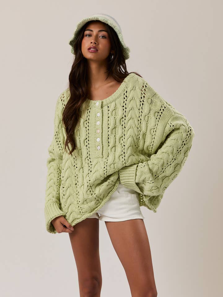 PULL EN MAILLE TORSADÉE pour la vente par LE LIS