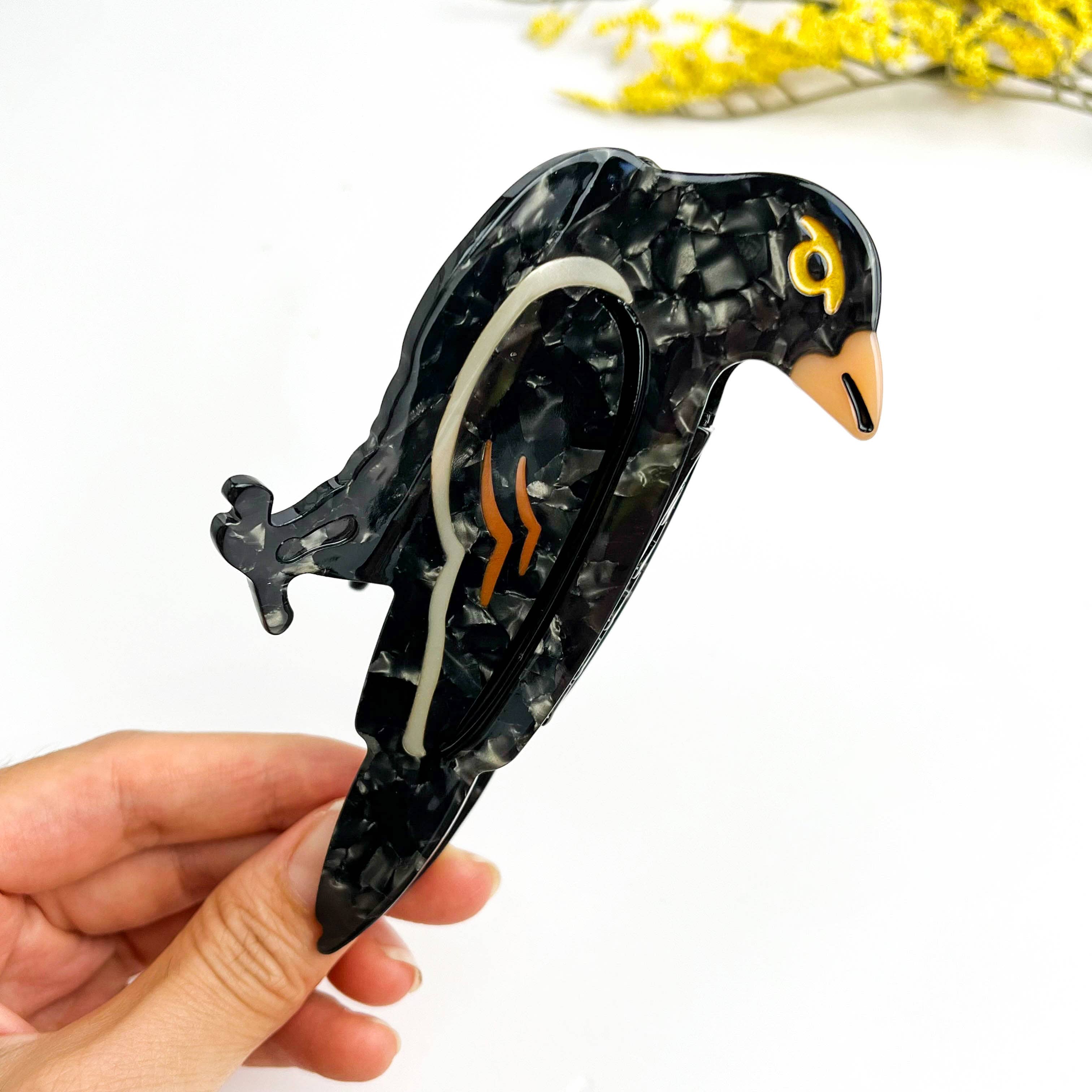 Black Moonlit Raven Acetate Hair Claw – Mysterious Gaze for wholesale on Faire2