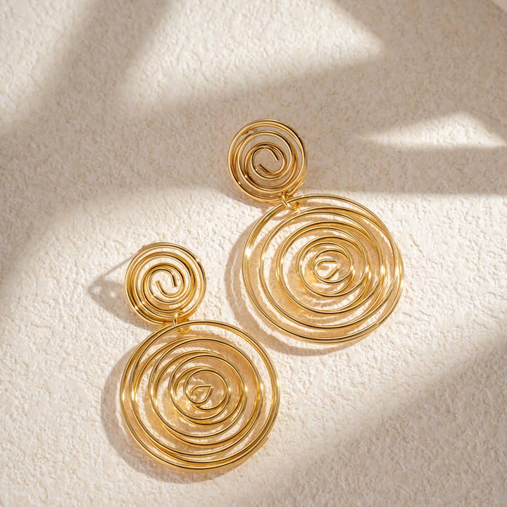 COSMOS - Wholesale Dangle Earrings - Dangling spiral earrings in stainless steel