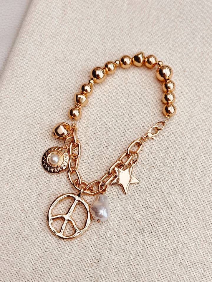 Gold Faux Pearl Charm Bracelet for wholesale by Juniper Wish