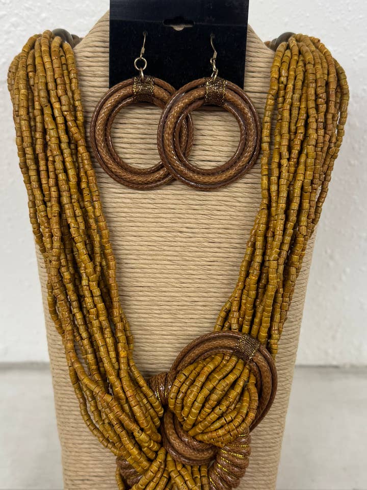 16 STRANDS BROWN/GOLD COCO BEADS WITH BROWN AND GOLD SPLASH for wholesale by International Duru's