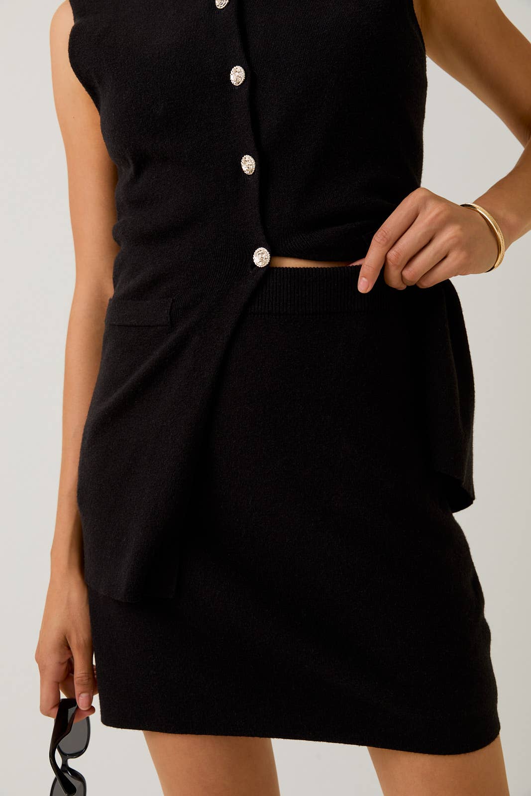 Black POWER SHOULDER BUTTON UP KNIT VEST & SWEATER SKORT for wholesale on Faire5