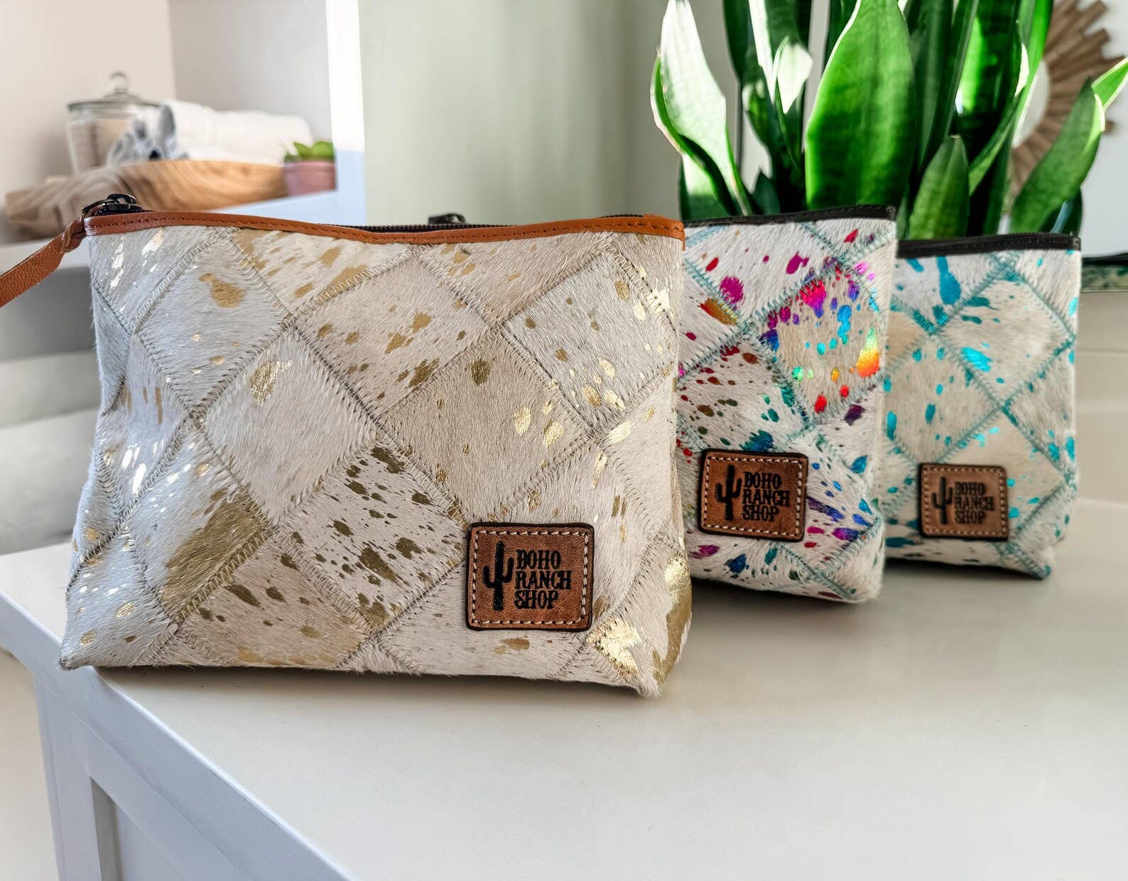Boho Ranch Shop - Venta al por mayor Bolsa para maquillaje - Neceser de viaje de piel de vaca a cuadros estilo occidental15