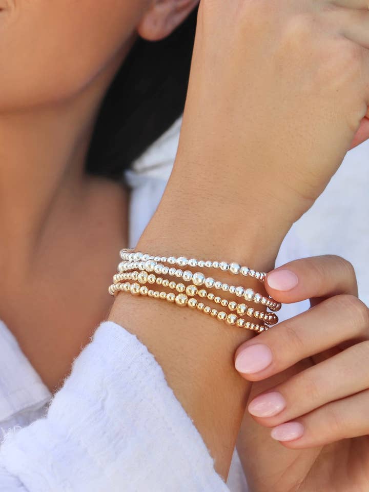 Graduated Stretch Stackable Bracelet Gold Filled or Sterling for wholesale by Kaylie Dawn Jewelry
